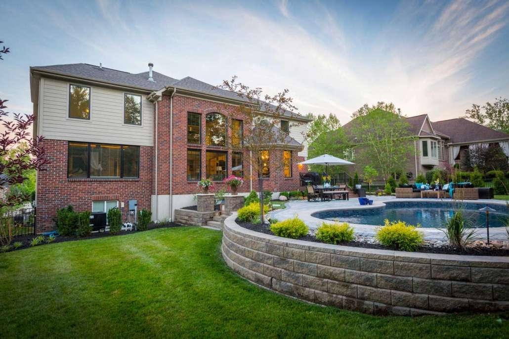 pool deck with retaining wall and plantings